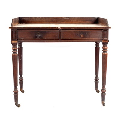 Lot 671 - A George III dressing table, in the manner of...