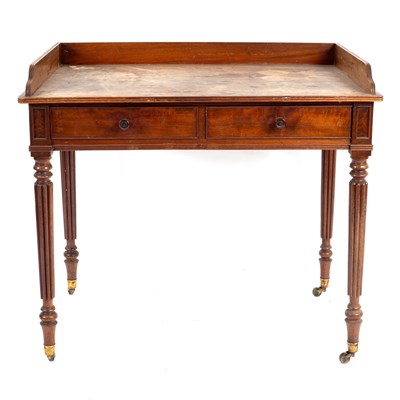 Lot 672 - A George III mahogany dressing table, in the...