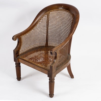 Lot 684 - A William IV rosewood bergère, circa 1835,...