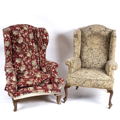 Lot 699 - A walnut wing armchair, in Queen Anne style,...