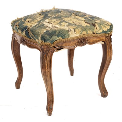 Lot 700 - A French provincial walnut stool, circa 1750,...