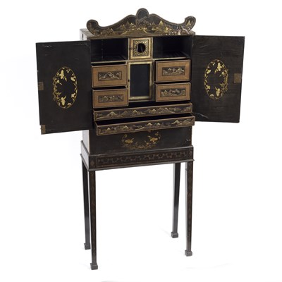 Lot 715 - A Chinese export lacquered cabinet on stand,...