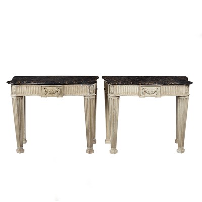 Lot 719 - A pair of painted console tables with Portor...