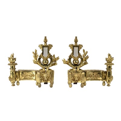 Lot 720 - A pair of gilt metal chenets, of neo-classical...