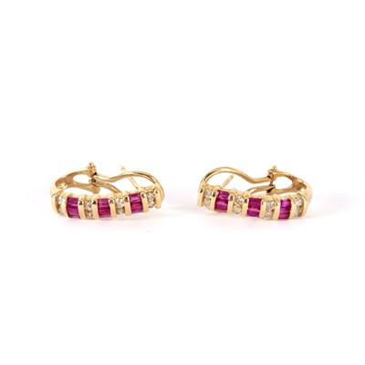 Lot 741 - A pair of ruby and diamond half hoop earrings,...