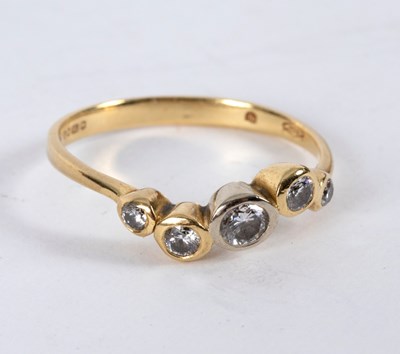 Lot 12 - A diamond five-stone ring of modern design,...