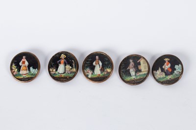 Lot 27 - Five hand painted buttons depicting figures in...