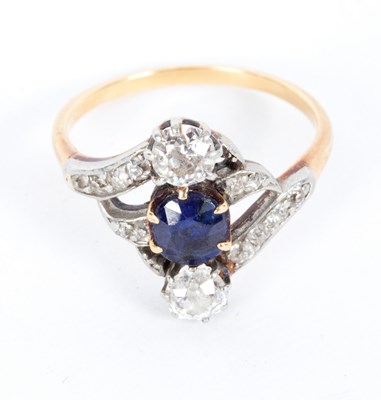 Lot 28 - A sapphire and diamond dress ring with split...