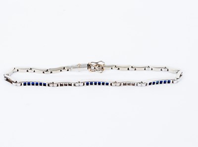 Lot 32 - A sapphire and diamond bracelet with three...