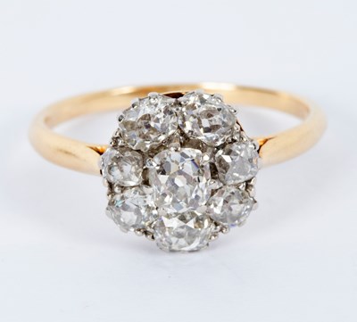 Lot 35 - A diamond cluster ring, the eight-stone...