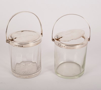 Lot 107 - A near pair of silver mounted jam jars,...