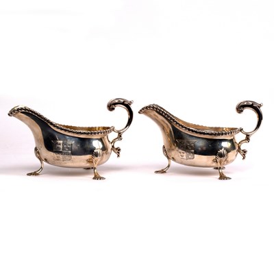 Lot 123 - A pair of 18th Century style silver sauce...