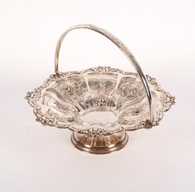 Lot 135 - A silver swing-handled basket, Birmingham 1900,...