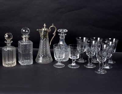 Lot 163 - A cut glass decanter with silver collar, two...