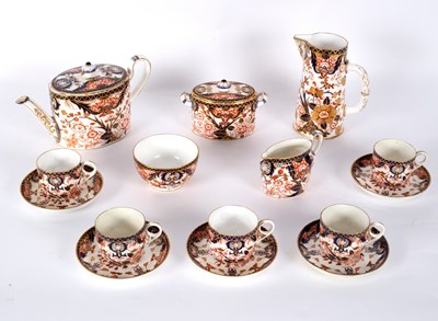 Lot 185 - A Derby Imari pattern part tea service of...