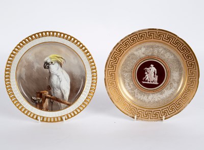 Lot 216 - A Minton cabinet plate painted a cockatoo on a...