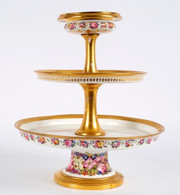 Lot 220 - A French porcelain three-tier cake stand, mid...