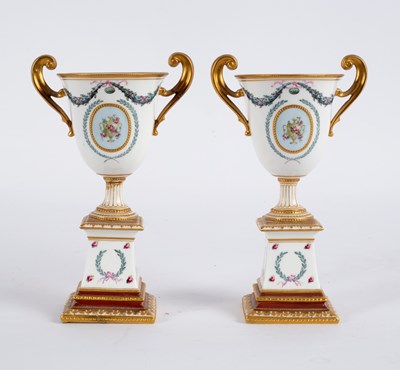 Lot 224 - A pair of Royal Crown Derby urns on stands,...