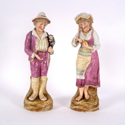 Lot 230 - A pair of French biscuit porcelain figures,...