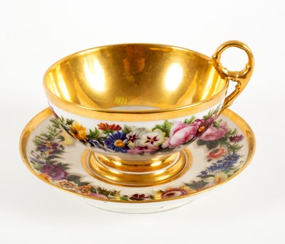 Lot 233 - A French porcelain oversize teacup and saucer,...