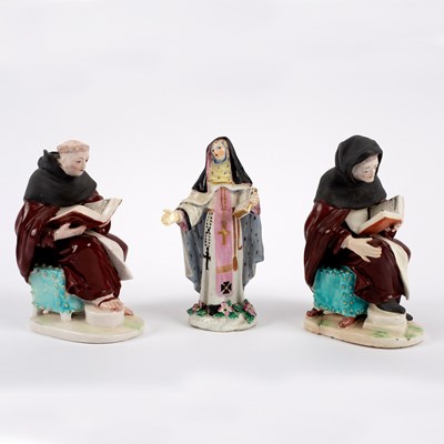 Lot 270 - Two Derby figures of seated friars and a...