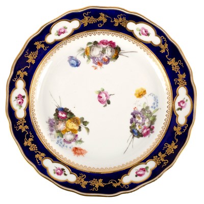 Lot 278 - A Derby blue ground plate, circa 1790, puce...