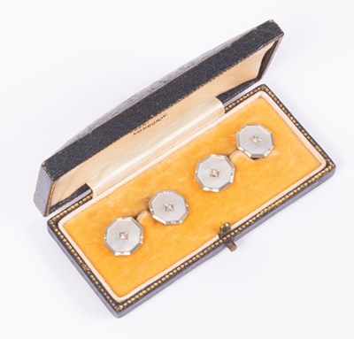 Lot 38 - A pair of mother-of-pearl and diamond cufflinks