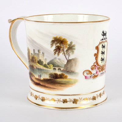 Lot 297 - An English porcelain armorial mug, circa 1800,...