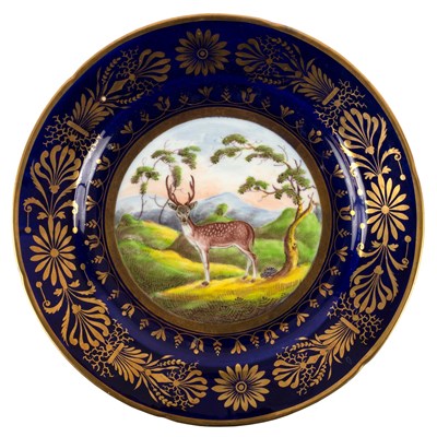 Lot 314 - A Coalport blue ground plate from the Animal...