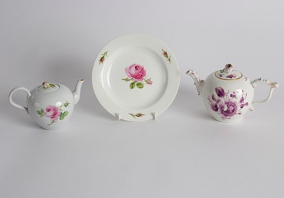 Lot 356 - Two Meissen teapots and covers and a plate,...