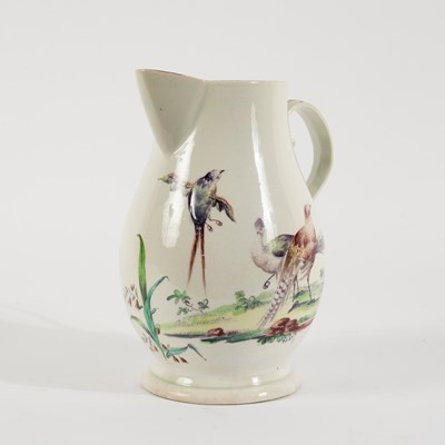 Lot 392 - A Derby cider jug, circa 1765, painted exotic...