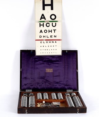 Lot 440 - An Optometrist's vision trial set in a wooden...