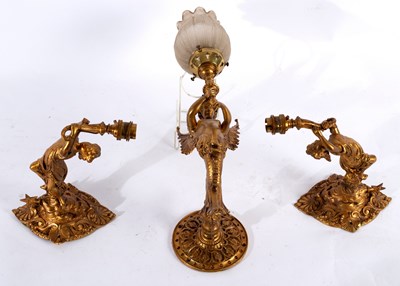 Lot 474 - A gilt metal wall light modelled as a siren...