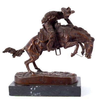 Lot 525 - After Frederic Remington, a bronze model of a...