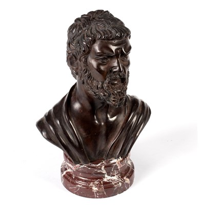 Lot 527 - A bronze bust of a bearded man on a veined...