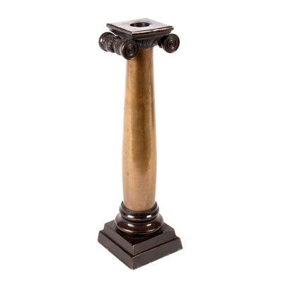 Lot 528 - A bronze candlestick of Ionic column form,...