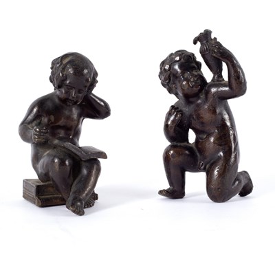 Lot 542 - A pair of Victorian bronze putti, one reading...