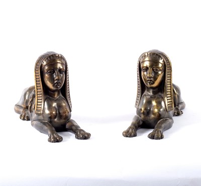 Lot 557 - A pair of cast bronze figures of Sphinx, 21cm...