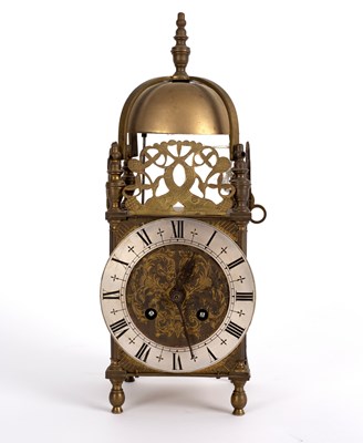 Lot 570 - A 19th Century small lantern type mantel clock...