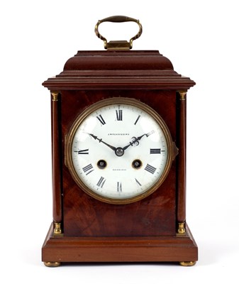 Lot 574 - A mahogany arched mantel clock, circa 1920,...