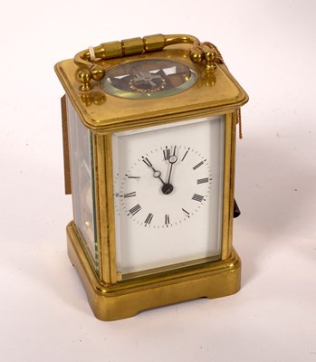 Lot 575 - A gilt brass cased carriage clock with...