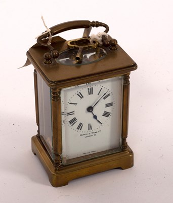 Lot 582 - A gilt brass cased carriage clock, the dial...