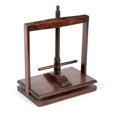 Lot 608 - A small 19th Century mahogany napkin press, 30....