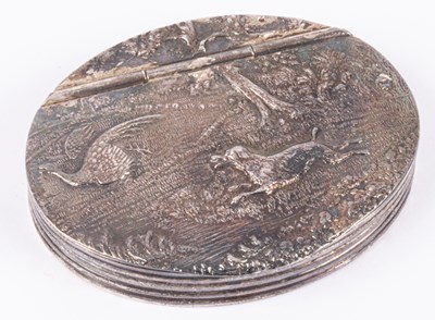 Lot 168 - An oval silver pill box retailed by Dunhill