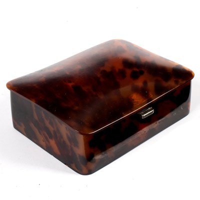 Lot 639 - A tortoiseshell box with silver hinges, 15cm wide