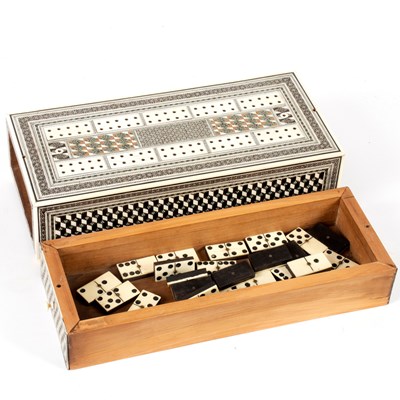 Lot 650 - An Anglo-Indian sadeli work gaming box, the...
