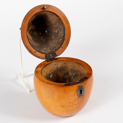 Lot 676 - A Georgian fruitwood tea caddy of pear form,...
