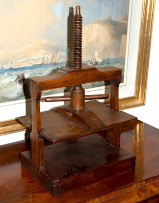 Lot 710 - A mid 19th Century mahogany napkin press with...