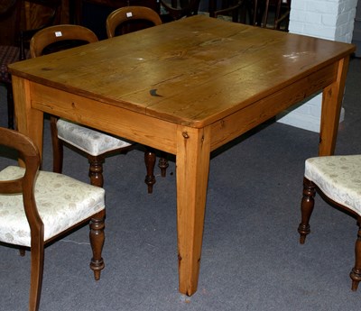 Lot 732 - A rectangular pine kitchen table fitted a...