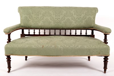 Lot 741 - An upholstered settee with spindle turned...